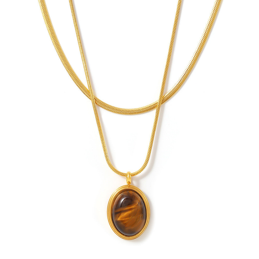 Autumn and winter stacked wearing Maillard style oval tiger’s eye stone pendant necklace light luxury stainless steel non-fading neck chain