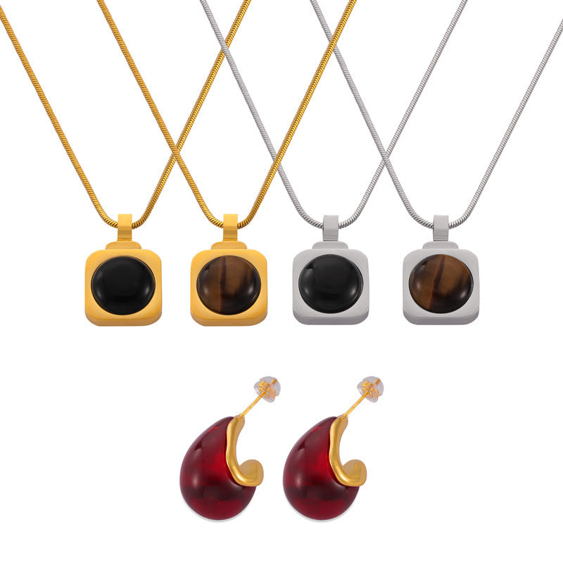 Hot-selling personalized light luxury jewelry inlaid with tiger’s eye design titanium steel jewelry set pp