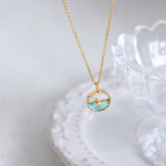 Simple personality fringed chain design sense blue pendant men’s and women’s titanium steel gold-plated jewelry set 99